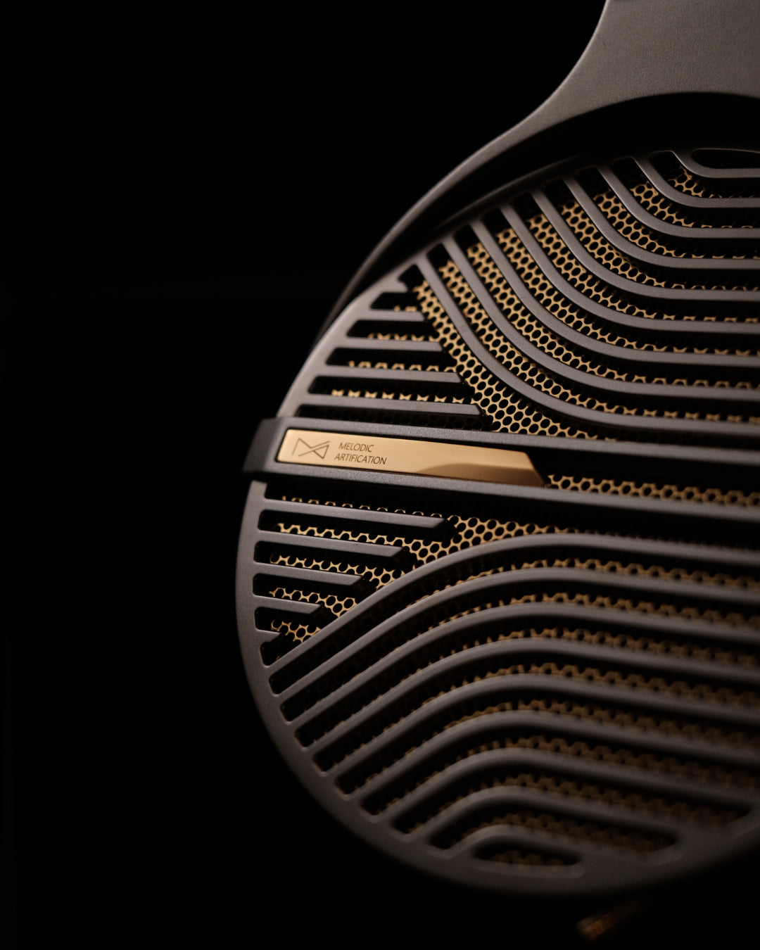 Melodic Artification Infinitum wave grille with brass nameplate