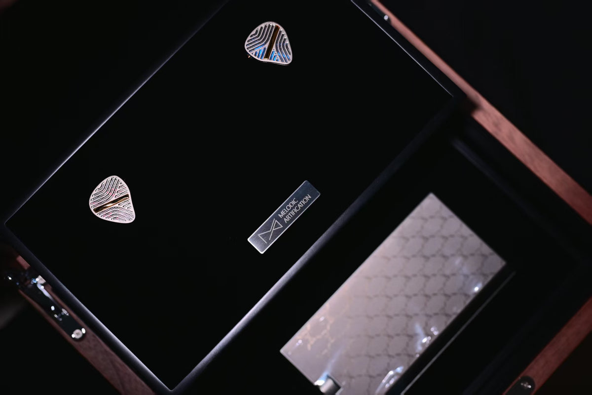 Melodic Artification Eternitum presentation case with IEMs and amplifier