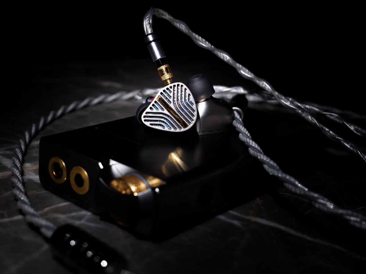Melodic Artification Eternitum IEM and cable on the companion amplifier