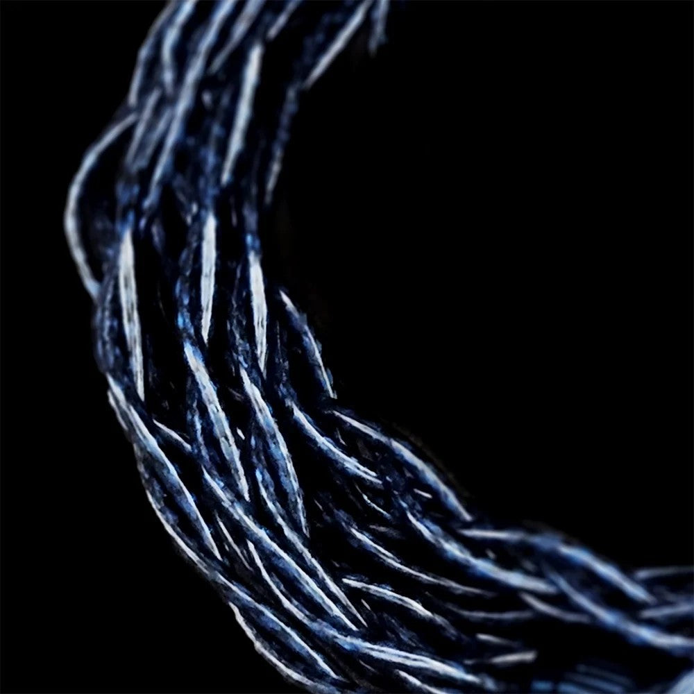 Close-up of the Nightjar Acoustics Blue Hour cable's blue and silver multi-strand braid